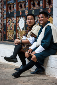 Two Bhutanese men in traditional dress, Punakha Dzong, Bhutan