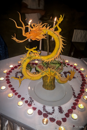 Dragon carved from marrow, Thien Canh Son Cave by candle-light, Bai Tu Long Bay, Vietnam