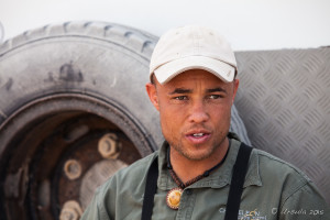 Portrait of a male Namibian guide, Namib desert.