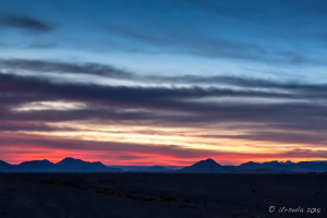 Blue and pink skies over desert dunes in Namib Desert, Namib-Naukluft Park, Namibia