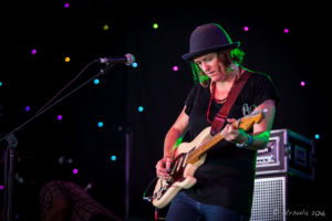 Julz Parker of Hussy Hicks on guitar, Byron Bay Bluesfest 2016