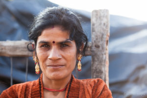 Rajasthani Woman in an Orange sweater, Thar Desert village, India
