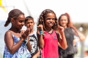 Young girls dancing in a crowd , Boomerang, Byron Bay Bluesfest 2016 AU