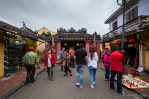 People on the road to the Japanese Covered Bridge, Hoi An Vietnam