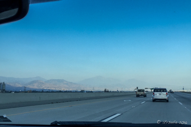 Lanscape: Smog over California Highway 210 towards the San Bernadino Mountains, USA