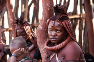 Portrait of a young married Himba woman, Kunene Namibia