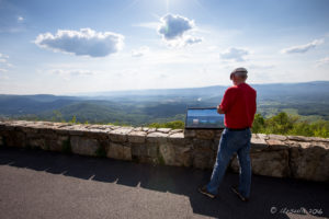 Man reading a park information sign, Dickey Ridge, Shenandoah National Park VA