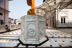 A six-sided marble, carved with prayers, Gurudwara Sis Ganj Sahib, Delhi