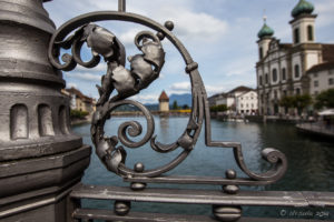 View of Lucerne through the ironworks of the Rathaussteg, Switzerland