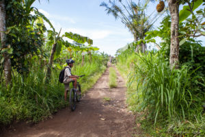 Cyclist on a dirt track, Bangli Regency, Bali
