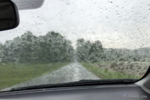 View through a windscreen over a rainy Blue Ridge Parkway, VA USA