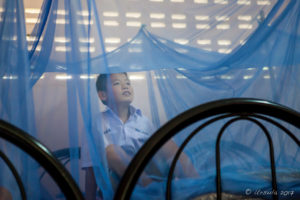 In the Mosquito Nets, Chumchon Lae Luang Prasit Wittaya Primary School speaking to young pupils, Chiang Mai Thailand