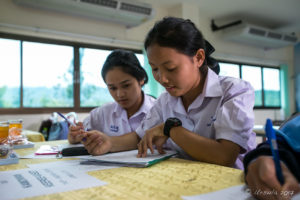 Thai female students filling in Forms, Jom Tong, Thailand