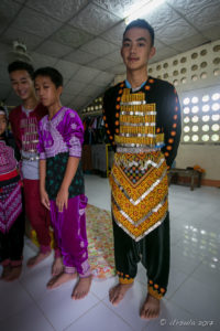 Hmong boys in traditional costume inside their Dormitory, Santisuk School, Chiang Mai Thailand