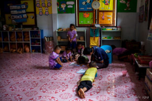 Thai children on the floor of a Classroom, Mae Sariang, Thailand