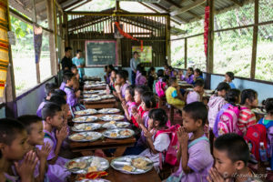 Karen children in a school canteen, Mae Sariang, Thailand