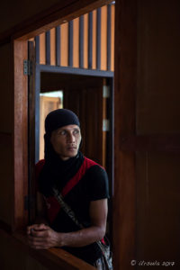 Thai labourer in a black head wrap, Mae Sariang, Thailand