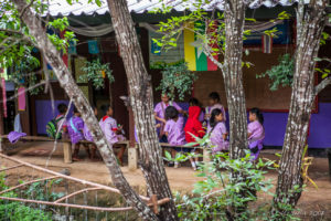 Children in Karen tunics outside their Classrooms, Mae Sariang, Thailand