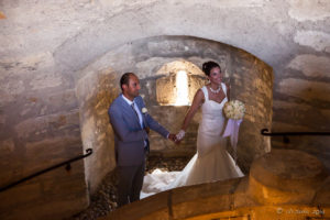 Portrait: bride and groom in low light inside the Munot, Schaffhausen Switzerland