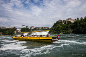 Yellow tourist boat on the Rhine Falls, Switzerland