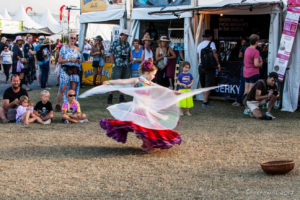 Young Girl Dancing in gypsy costumes, Byron Bay Bluesfest 2017, Australia