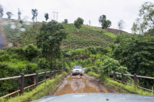 Oncoming truck on a muddy bridge in the hills of Mae Hong Son, Thailand.