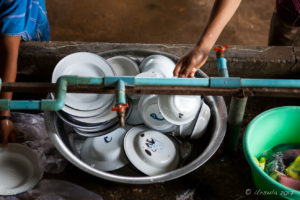 Enamel dishes in a bowel, Ban Tha Song Kwae School, Mae Hong Son, Thailand
