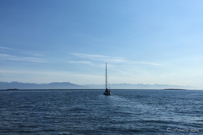 Catalina sailboat under motor on the Strait of Georgia, BC