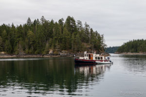 Motor boat in Desolation Sound, BC Canada