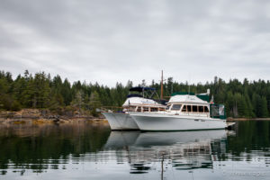 Two large Motor Cruisers on Squirrel Cove, Cortes Island BC Canada