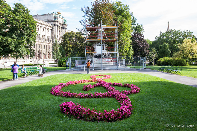 A red planted treble clef, Mozart Monument and Ephesos Museum, Burggarten Vienna Austria