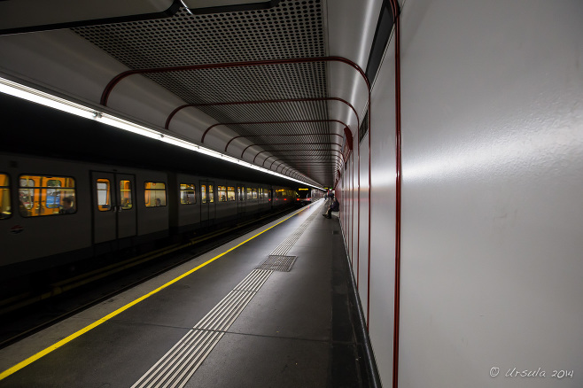 A Viennese subway with a moving train in it, Austria