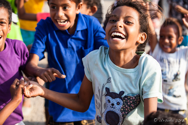 Over-excited Motu children, Hanuabada Village, Papua New Guinea