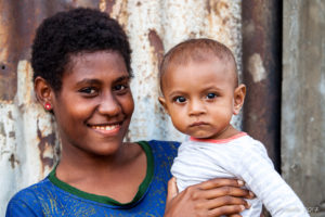 Motu mother and baby, Hanuabada Village, Papua New Guinea