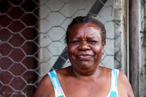 Motu Woman on her Porch, Hanuabada Village, Papua New Guinea