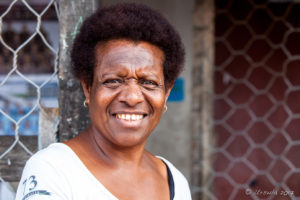 Motu Woman on her Porch, Hanuabada Village, Papua New Guinea