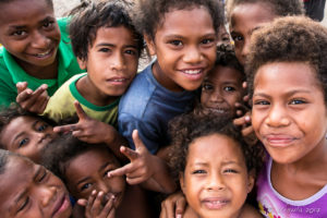 Excited of Motu children, Hanuabada Village, Papua New Guinea