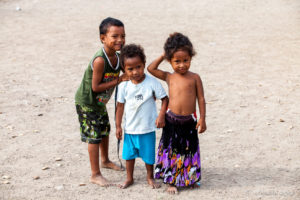 Trio of Motu children, Hanuabada Village, Papua New Guinea