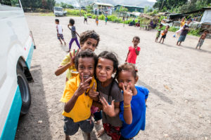 Motu children posing in the carpark, Hanuabada Village, Papua New Guinea