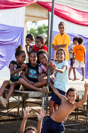 ver-excited Motu children, Hanuabada Village, Papua New Guinea