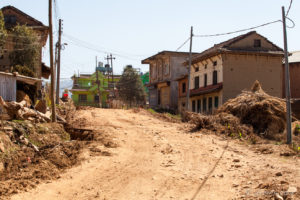 Dusty road of houses on Panauti-Namobuddha Rd, Nepal