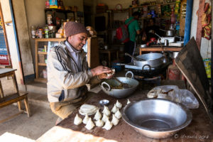 Nepali man making samosas, Panauti-Namobuddha Rd, Nepal