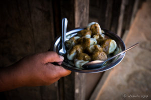 Plate of large, freshly sauced momos, Panauti-Namobuddha Rd, Nepal