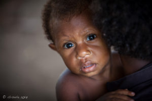 Papuan infant, market, Maprik PNG