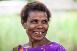 Portrait: Smiling Papuan woman, Maprik PNG