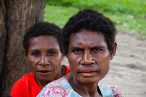 Portrait of Papuan women with tattooed faces, Maprik PNG
