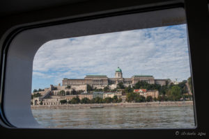 Buda Castle through a porthole non the Danube, Budapest Hungary