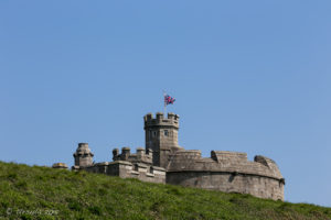 Flag atop atop Pendennis Castle Keep and Gun Platform, Falmouth Cornwal UK