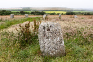 View over the granite megaliths of the Merry Maidens across the Cornish countryside, UK