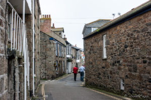 Narrow, winding Mousehole street, Cornwall UK